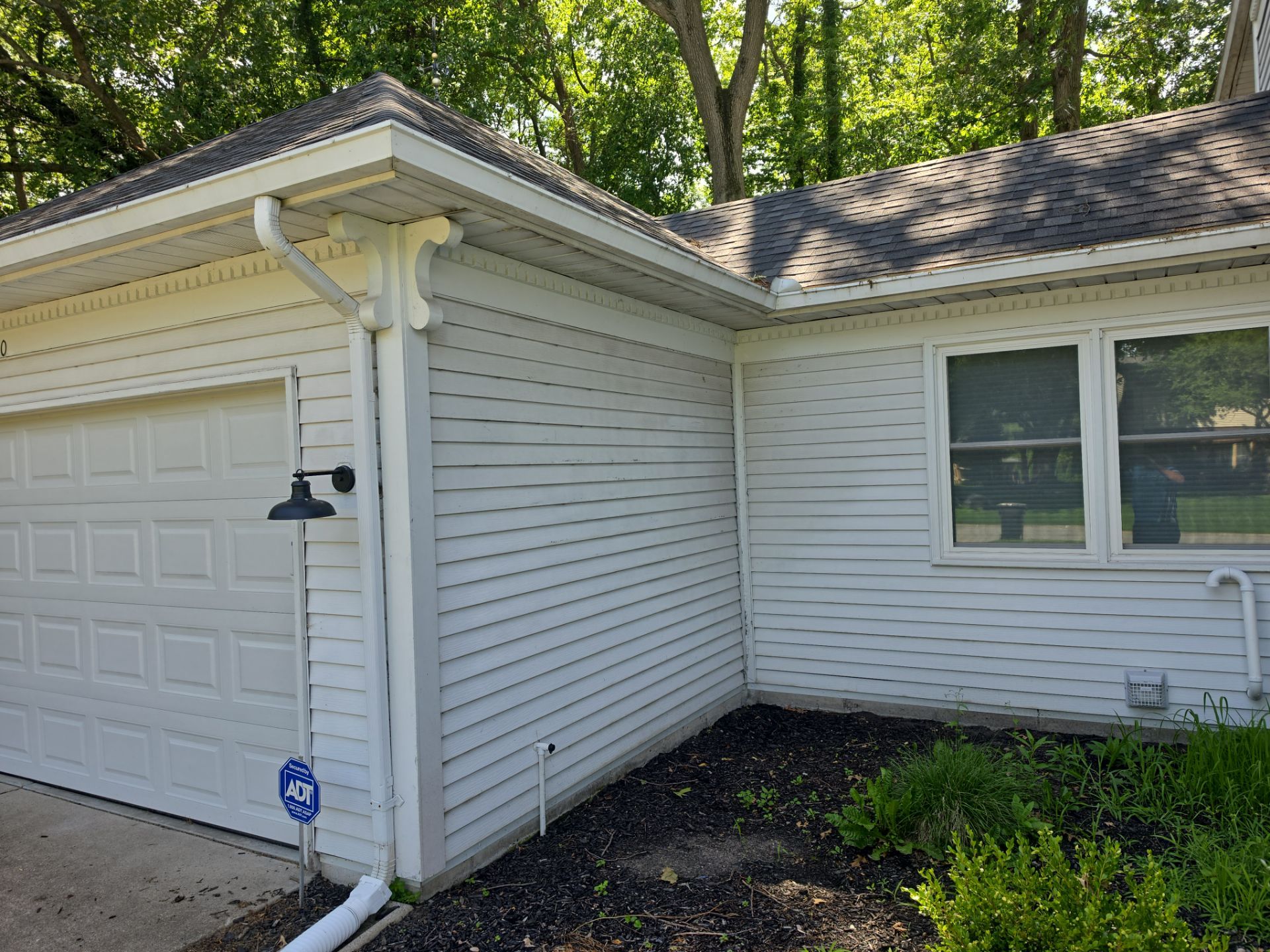 Why Granger Homeowners Soft Wash Vinyl Siding In Spring (Not Pressure Wash It) 1 Before — Even Light Organic Growth And Dirt Buildup In Shaded Corners Can Dull Your Home'S Curb Appeal Before A Professional Soft Wash Restores Its Bright Look. — Double A Power Washing