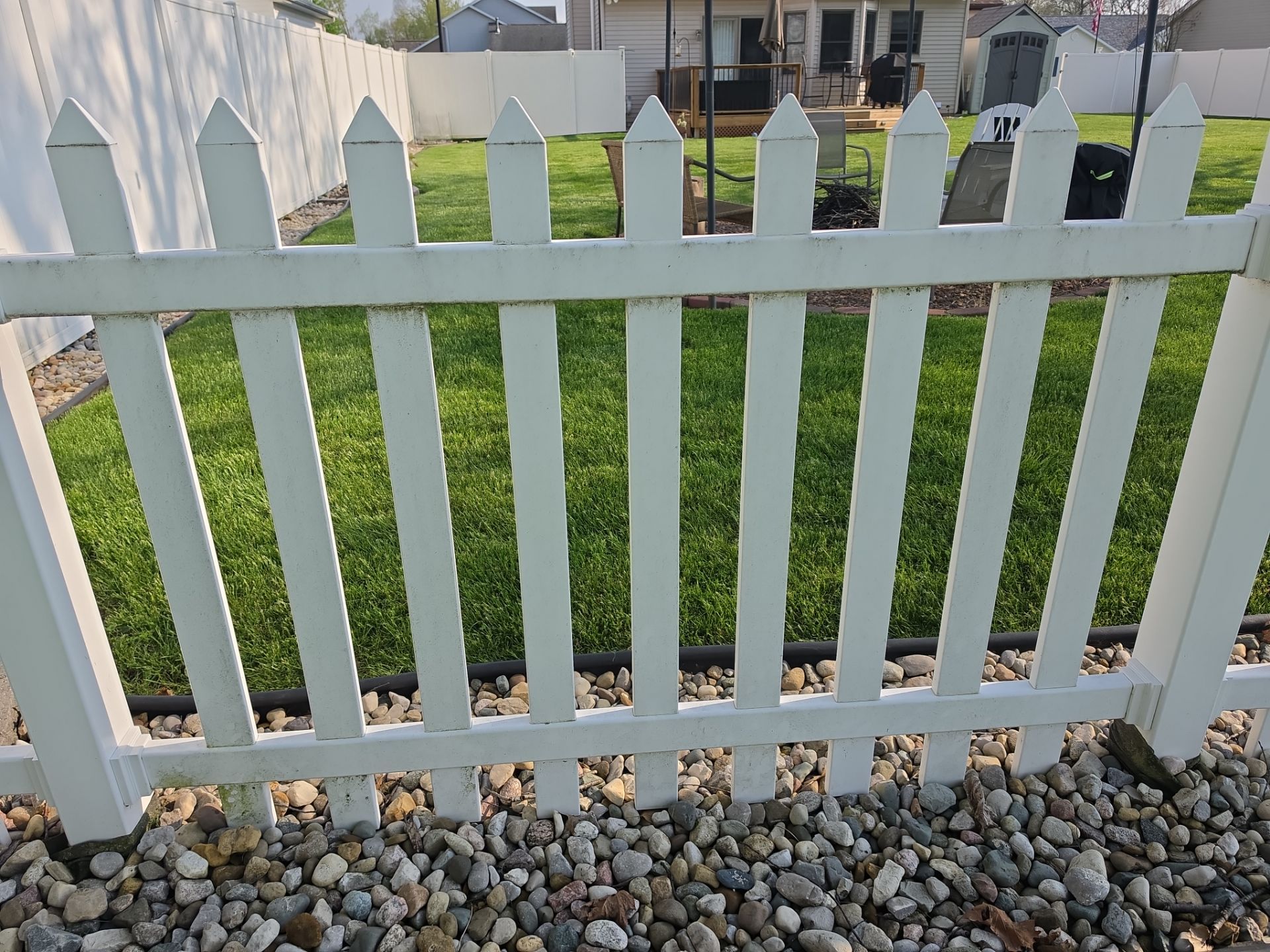 Composite Deck Cleaning Myths: What Michiana Homeowners Get Wrong About Trex And Timbertech 1 Before — Algae And Organic Growth Can Quickly Dull The Appearance Of A White Vinyl Fence, But A Professional Soft Wash Safely Restores Its Bright, Clean Look. — Double A Power Washing