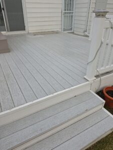 Before — Even Low-Maintenance Composite Decks Can Develop Deep-Seated Mold And Mildew In Their Textured Grain, Requiring A Professional Soft Wash To Safely Restore Their Clean Appearance. — Double A Power Washing