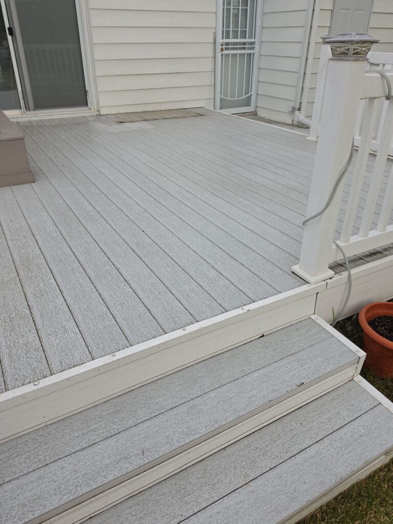 Before — Even Low-Maintenance Composite Decks Can Develop Deep-Seated Mold And Mildew In Their Textured Grain, Requiring A Professional Soft Wash To Safely Restore Their Clean Appearance. — Double A Power Washing