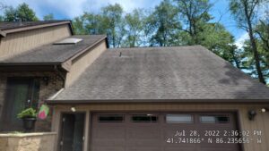 Blog 5 Before — This Roof Showed Heavy Black Algae Streaking Before Our Soft Wash Treatment Safely Restored Its Appearance. — Double A Power Washing