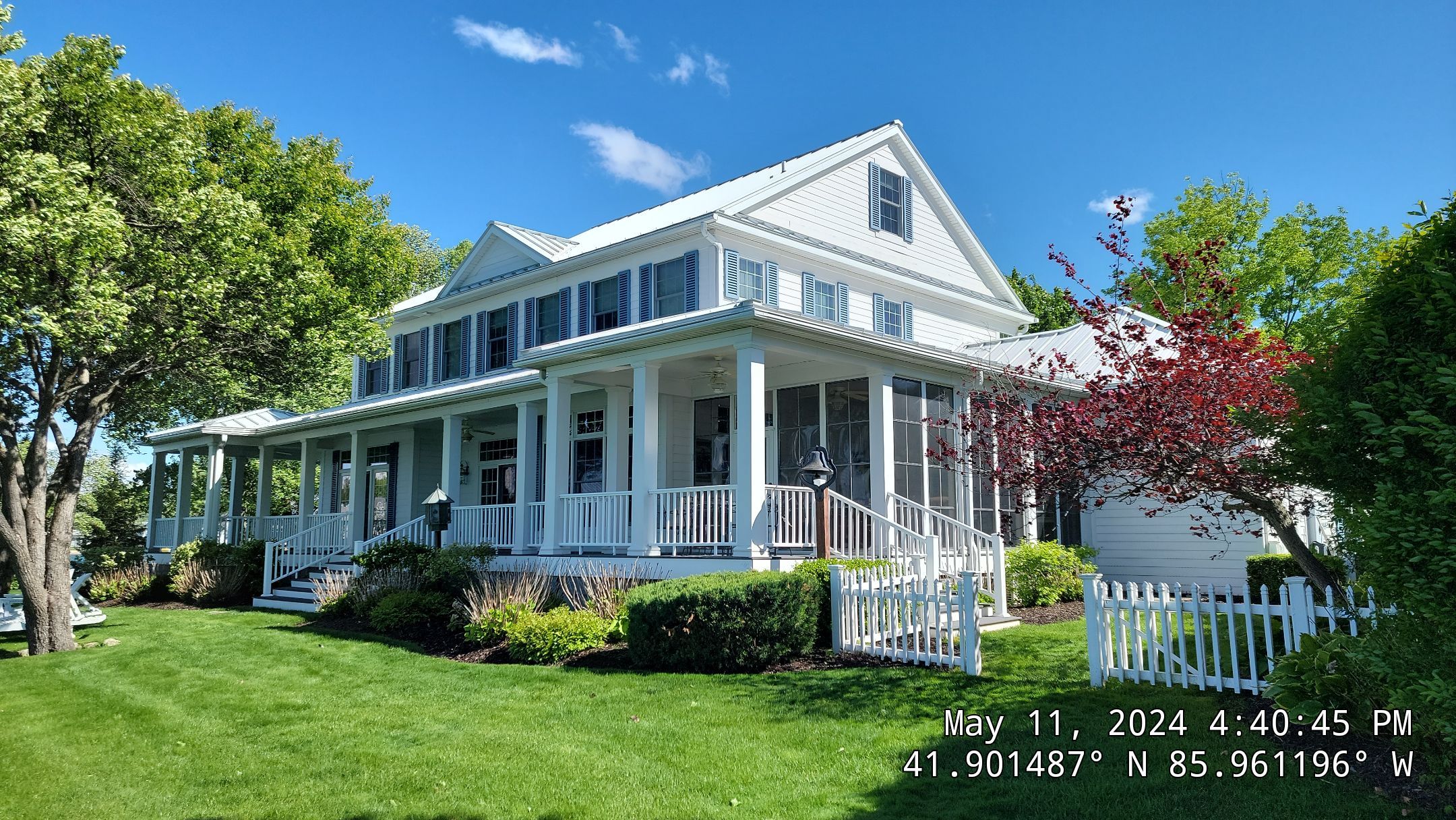 After: A Professional Soft Wash Keeps White Siding Looking Bright And Clean, Enhancing This Home'S Curb Appeal.. Double A Power Washing