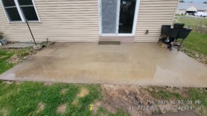Dirt And Organic Staining On Concrete Patio. Roof Cleaning. Double A Power Washing