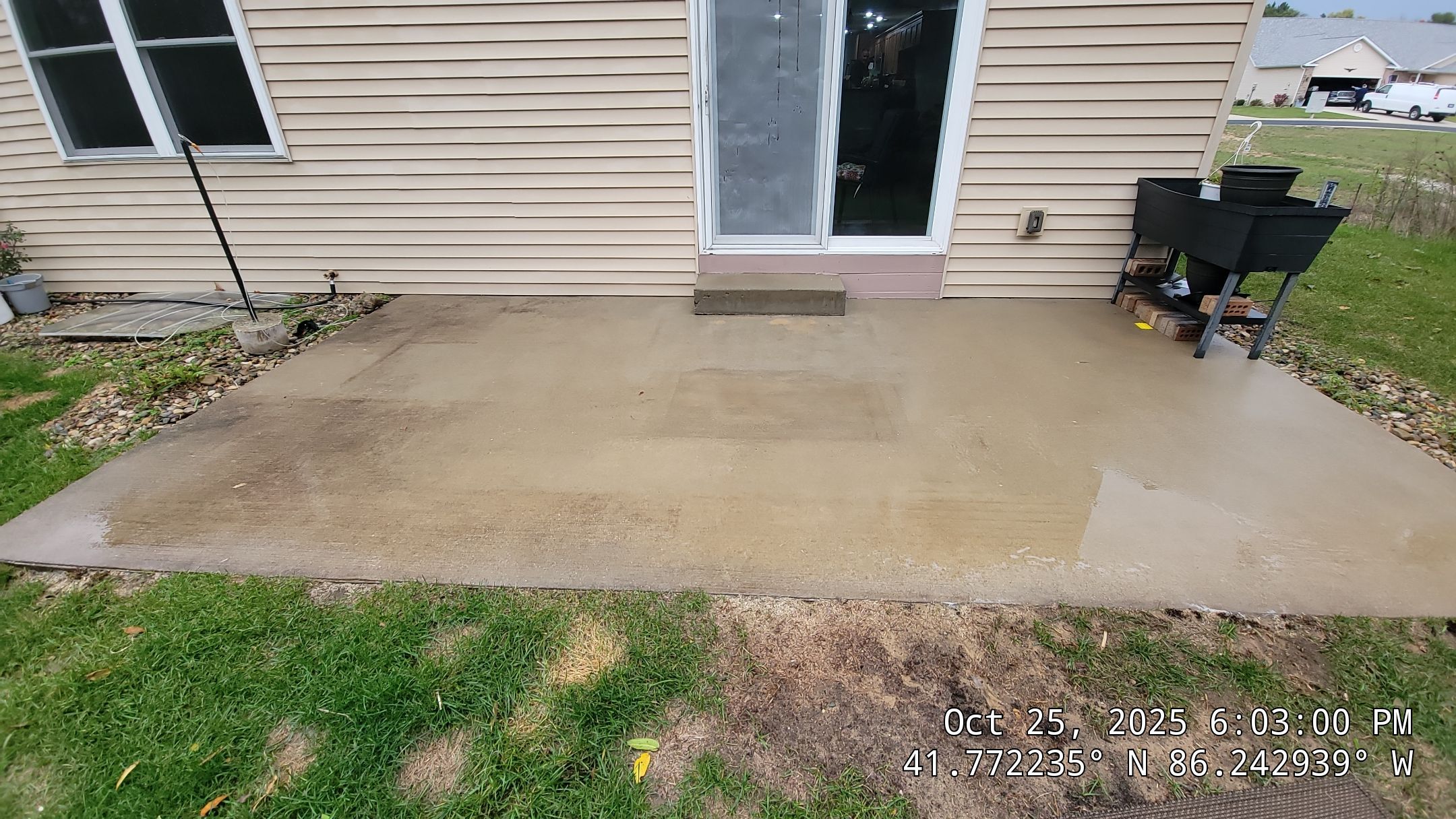 Dirt And Organic Staining On Concrete Patio. Roof Cleaning. Double A Power Washing