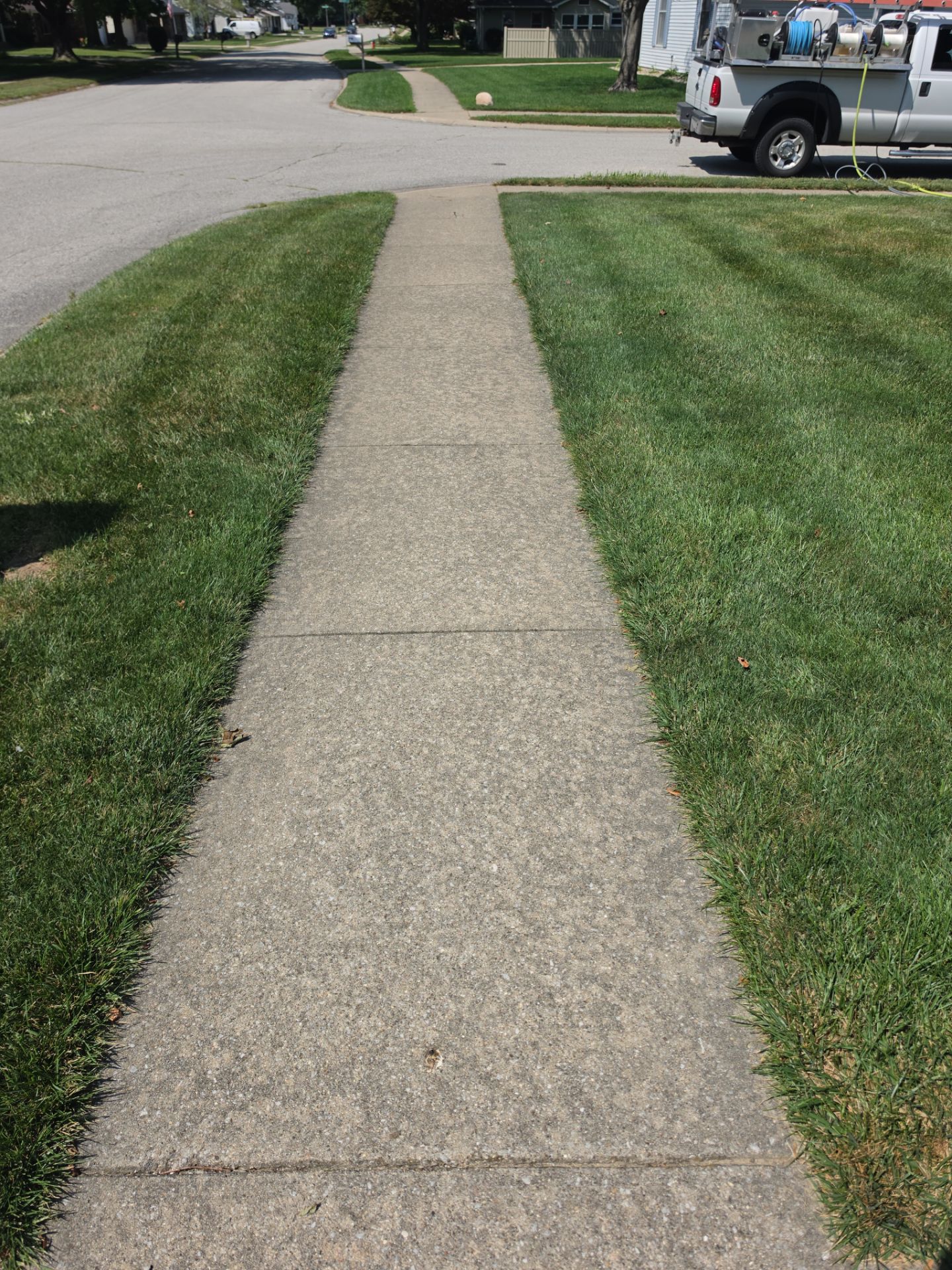 A Neglected Front Sidewalk Can Drag Down Curb Appeal, But A Professional Power Wash Quickly Brightens It Back Up. Concrete And Driveway Cleaning In South Bend, In. Double A Power Washing